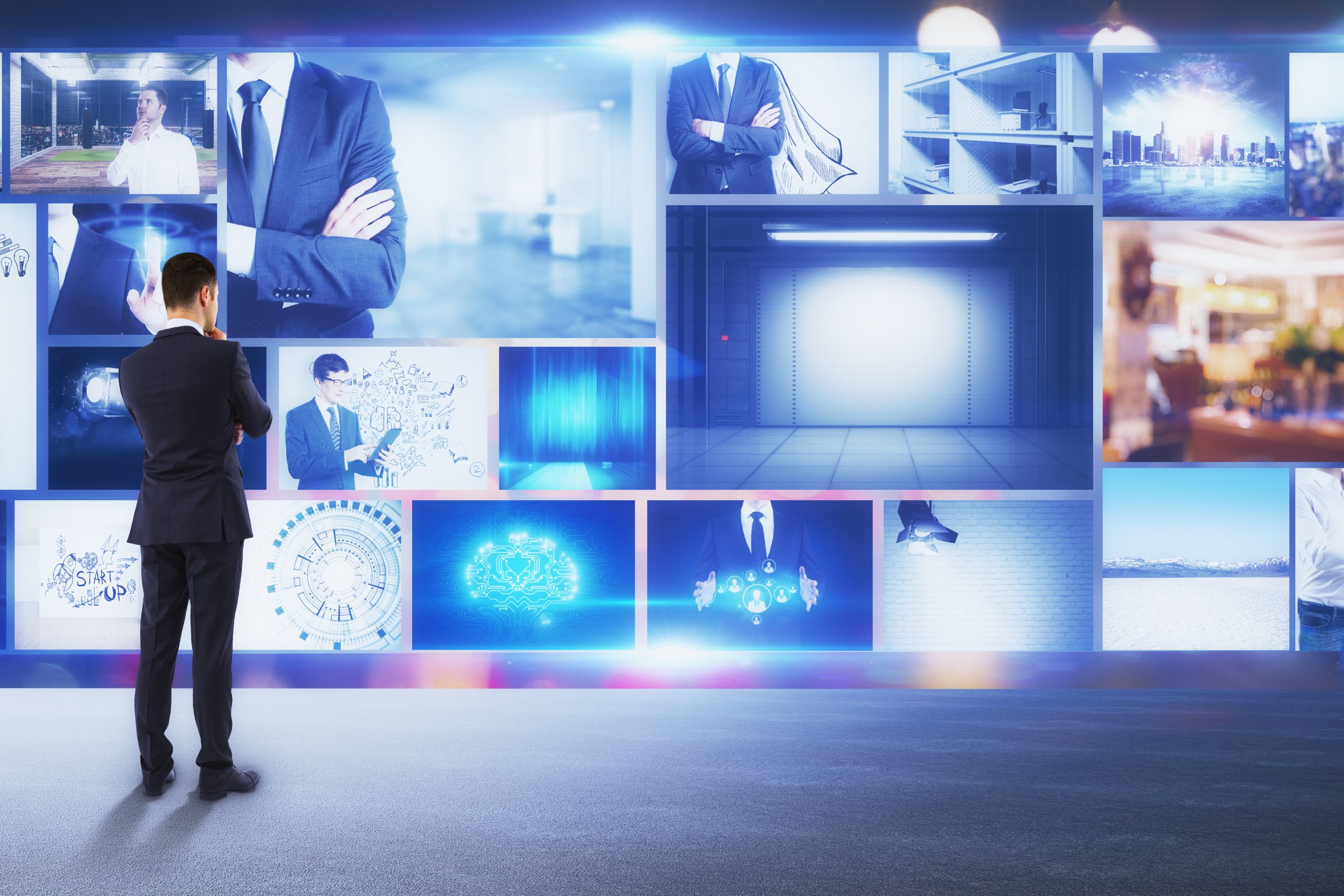 businessman-looking-at-abstract-digital-picture-ga-2026-01-11-08-35-22-utc (1)